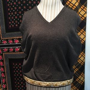 Cashmere v neck sweater vest with beaded trim.
